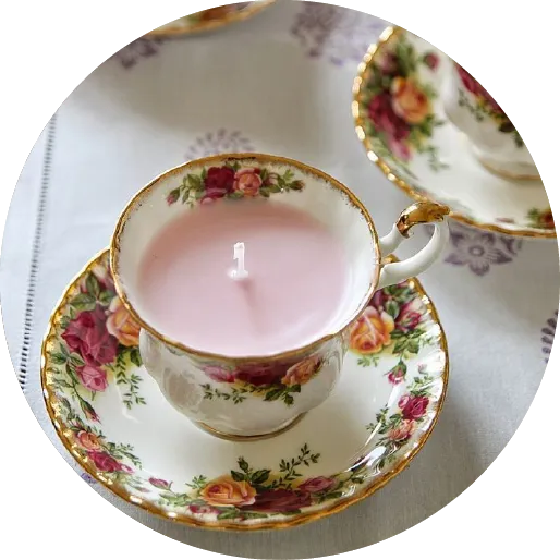 Vela en taza vintage